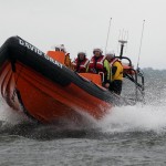 Ardboe Lifeboat escorting the Olympic Torch across Lough Neagh